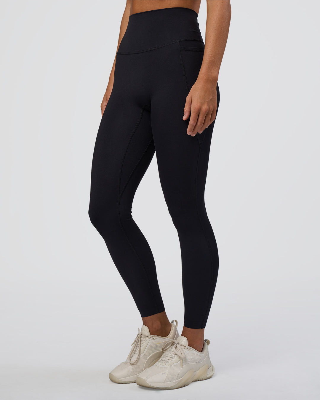 Woman wearing Elixir Ultra High-Rise Full Length Legging Pockets - Black | Model:Amity | Size:S