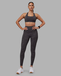 Woman wearing Elixir Ultra High-Rise Full Length Legging Pockets - Dark Storm Wash | Model:Rhiley | Size:S