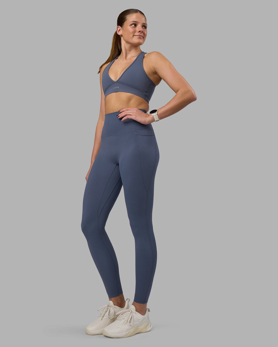 Woman wearing Elixir Ultra High-Rise Full Length Legging Pockets - Night Shadow | Model:Phoebe | Size:S