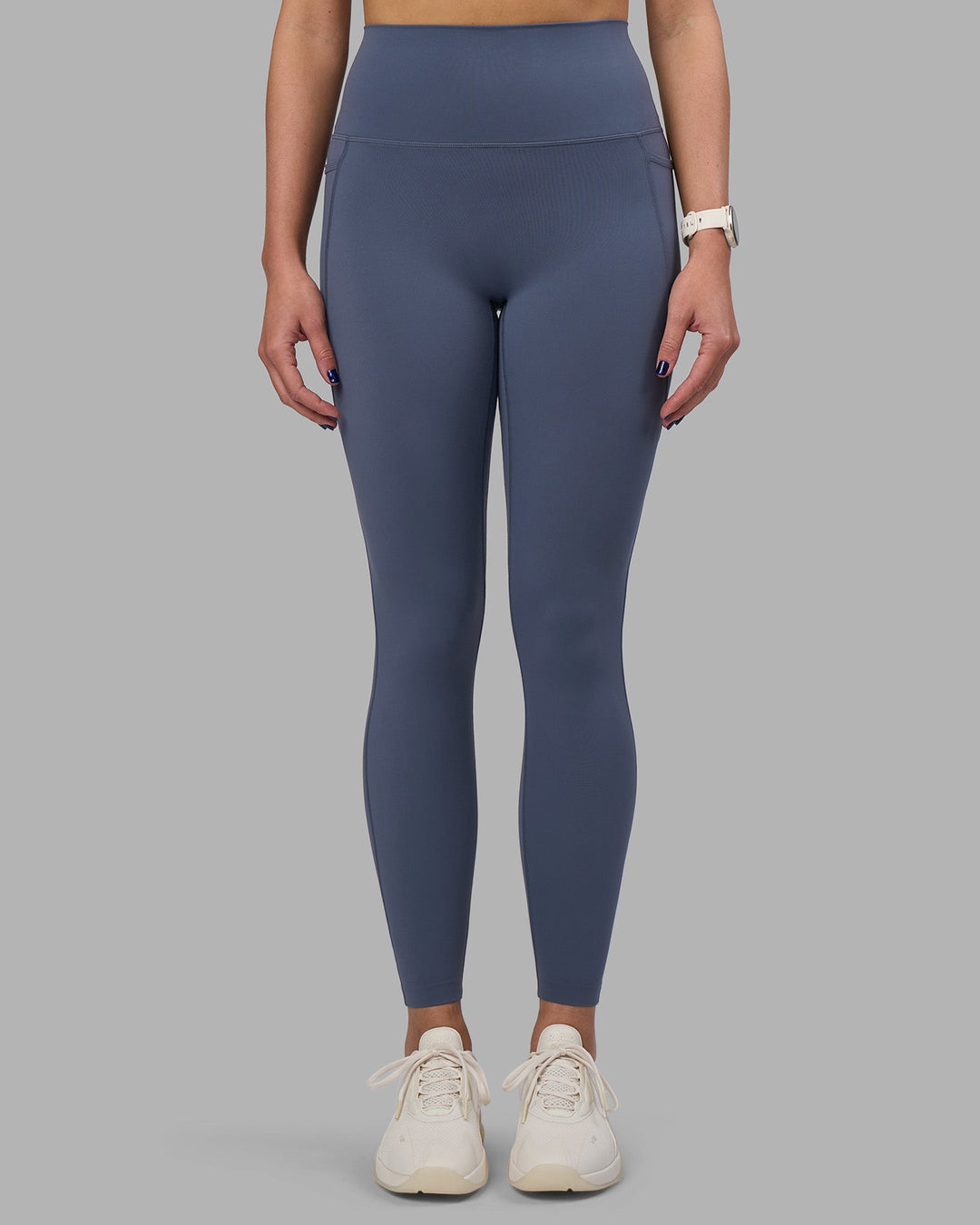 Woman wearing Elixir Ultra High-Rise Full Length Legging Pockets - Night Shadow | Model:Phoebe | Size:S