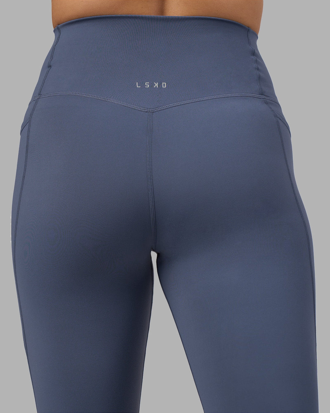 Woman wearing Elixir Ultra High-Rise Full Length Legging Pockets - Night Shadow | Model:Phoebe | Size:S