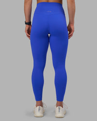 Woman wearing Elixir Ultra High-Rise Full Length Legging - Power Cobalt | Model:Keisha | Size:S
