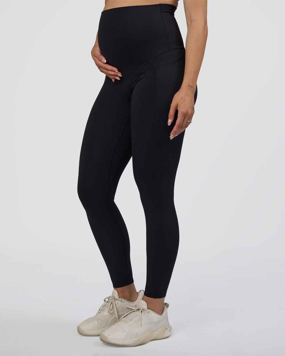 Woman wearing Elixir Ultra High-Rise Maternity Full Length Legging Pockets - Black | Model:Kitahna | Size:S
