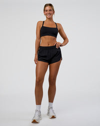 Woman wearing Energy 1.8" Training Short - Black | Model:Amity | Size:S