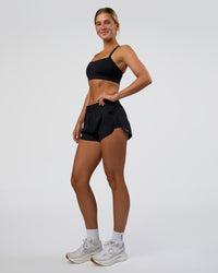 Woman wearing Energy 1.8" Training Short - Black | Model:Amity | Size:S