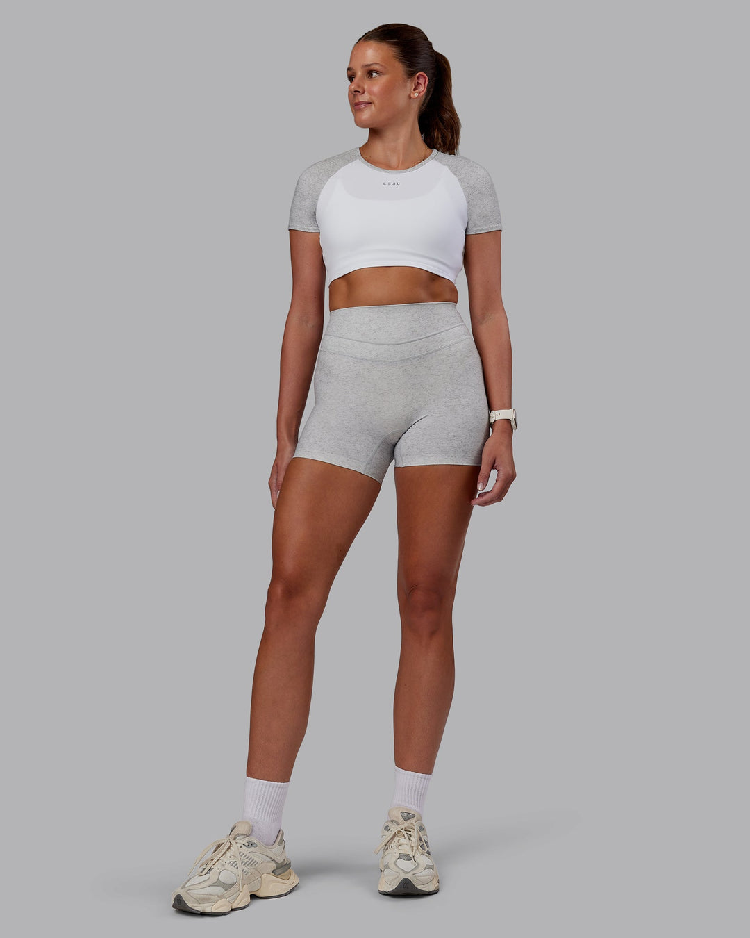 Woman wearing Enhance Ultra High-Rise 4" Short - Grey Marl | Model:Phoebe | Size:S