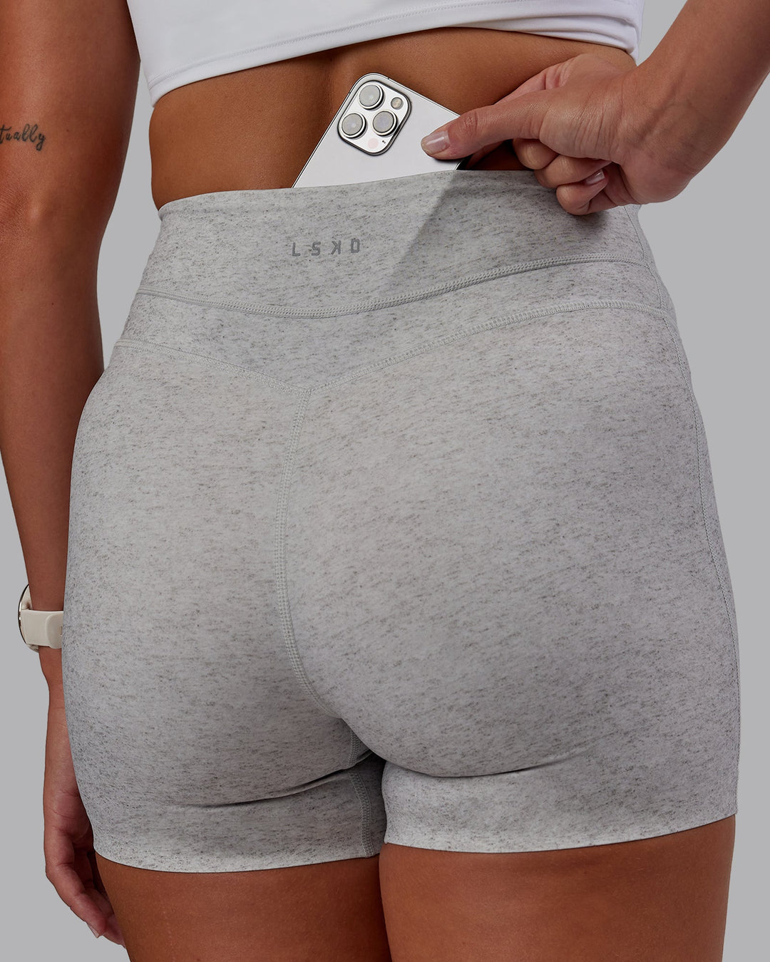 Woman wearing Enhance Ultra High-Rise 4" Short - Grey Marl | Model:Phoebe | Size:S
