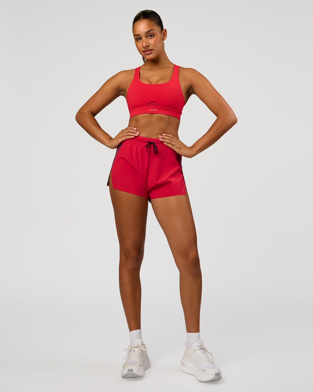 Woman wearing Fast Track Sports Bra Scarlet | Model:Bianca | Size:S | - view 3