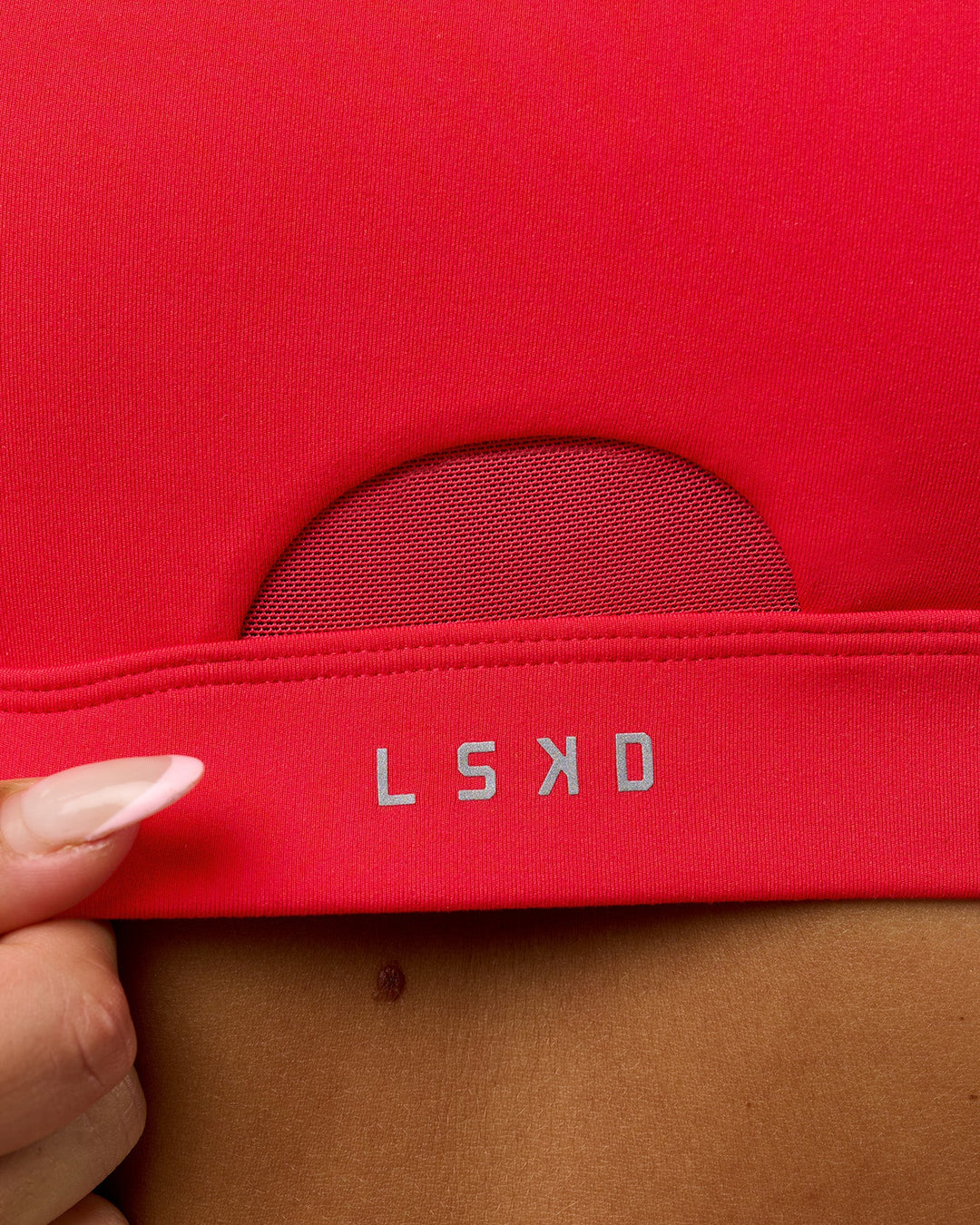 Woman wearing Fast Track Sports Bra Scarlet | Model:Rosie | Size:S | - view 7