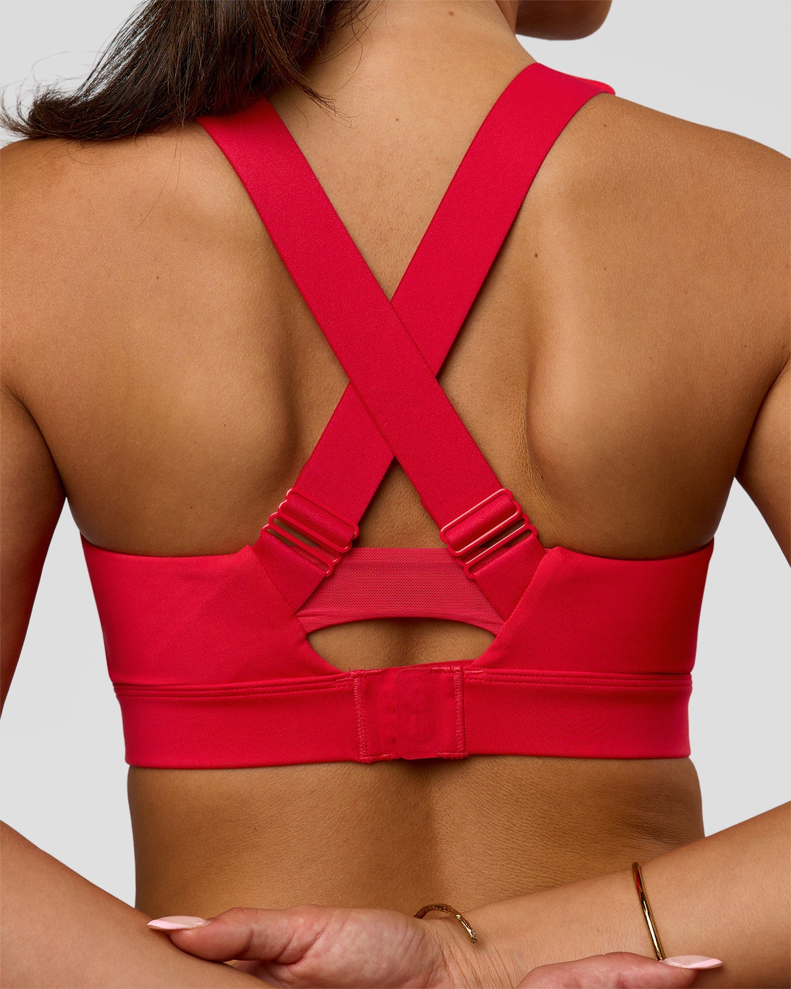 Woman wearing Fast Track Sports Bra Scarlet | Model:Rhiley | Size:S |