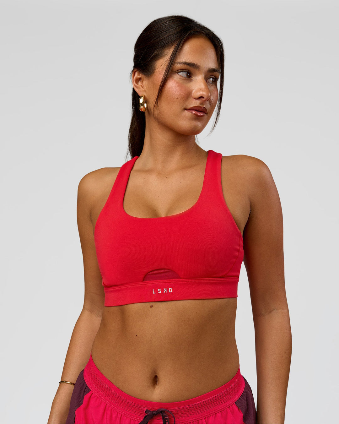 Woman wearing Fast Track Sports Bra Scarlet | Model:Bianca | Size:S | - view 4