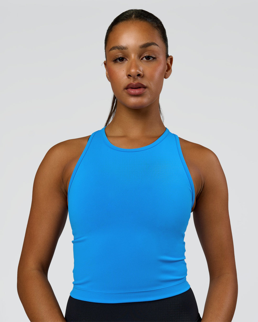 Woman wearing Flow Performance Tank 2.0 - Palace Blue | Model:Rosie | Size:S - view 1