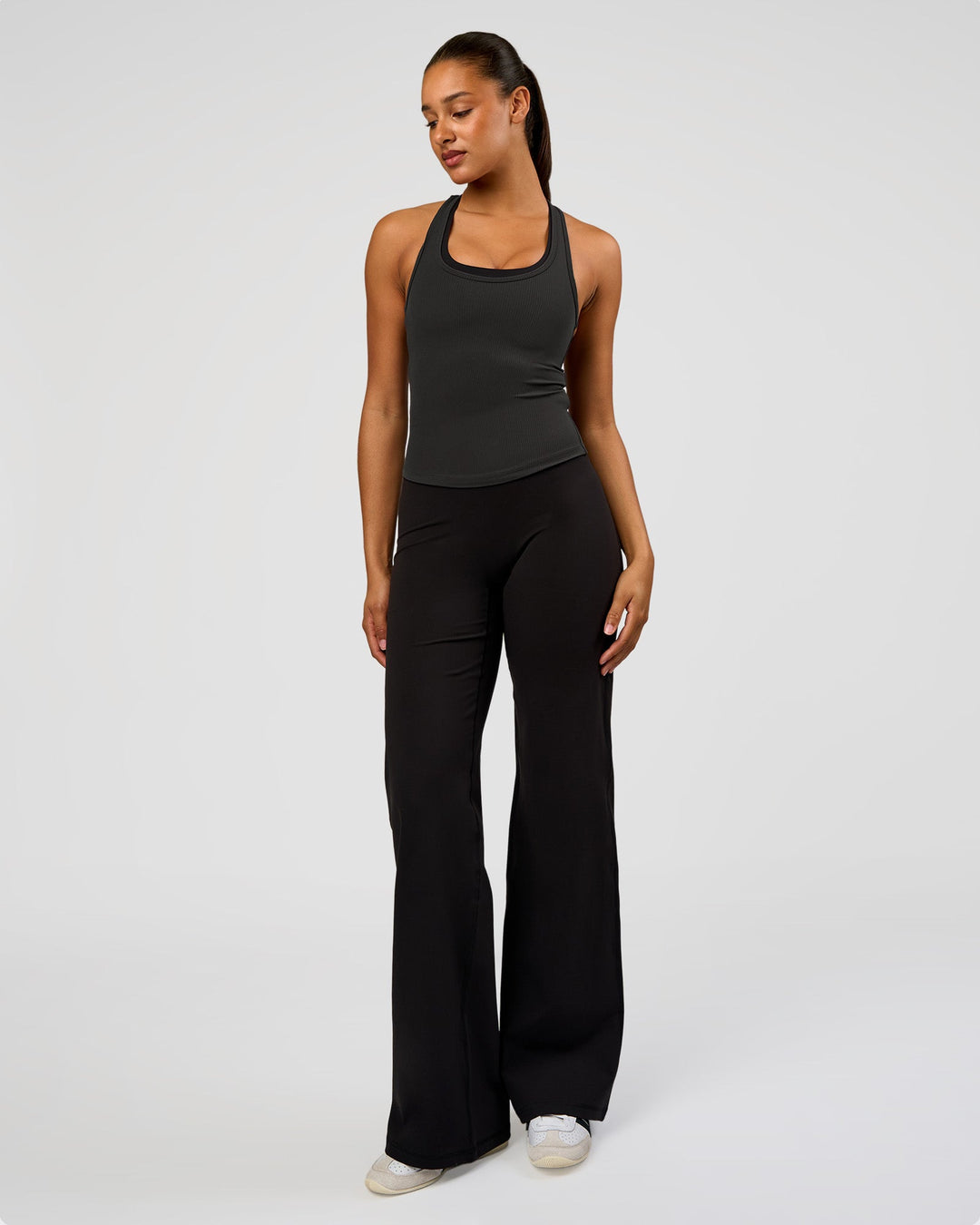 Woman wearing Flow Rib Scoop Neck Tank - Onyx | Model:Rosie | Size:S - view 4