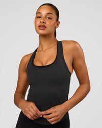 Woman wearing Flow Rib Scoop Neck Tank - Onyx | Model:Rosie | Size:S