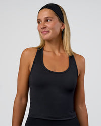 Woman wearing Flow Scoop Neck Performance Tank - Black | Model:Amity | Size:S | Thumbnail Index: 2