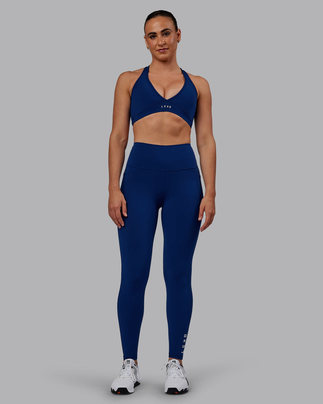 Woman wearing Flux Full Length Leggings - Midnight Blue