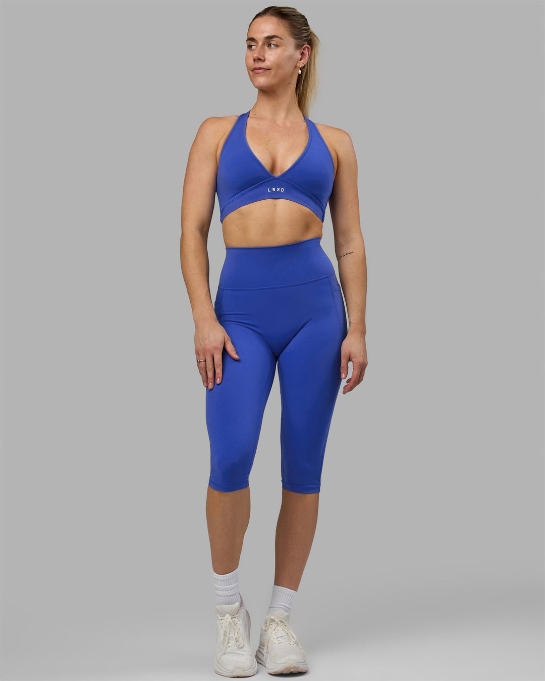 Woman wearing Fusion 3/4 Length Leggings - Power Cobalt