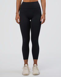 Woman wearing Fusion Ultra High-Rise 7/8 Legging Pockets - Black | Model:Amity | Size:S