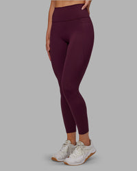 Woman wearing Fusion Ultra High-Rise 7/8 Legging Pockets - Cherry Lacquer | Model:Paris | Size:S | Thumbnail Index: 2