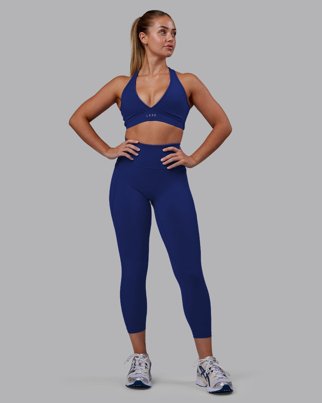 Woman wearing Fusion 7/8 Length Leggings - Midnight Blue