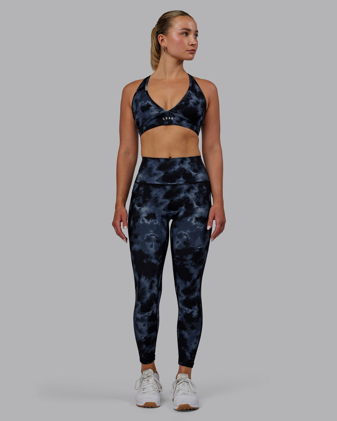 Woman wearing Fusion 7/8 Length Leggings - Tie Dye-Midnight