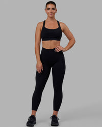 Woman wearing O.G. Fusion Ultra High-Rise 7/8 Legging Pockets - Black | Model:Annabelle | Size:S