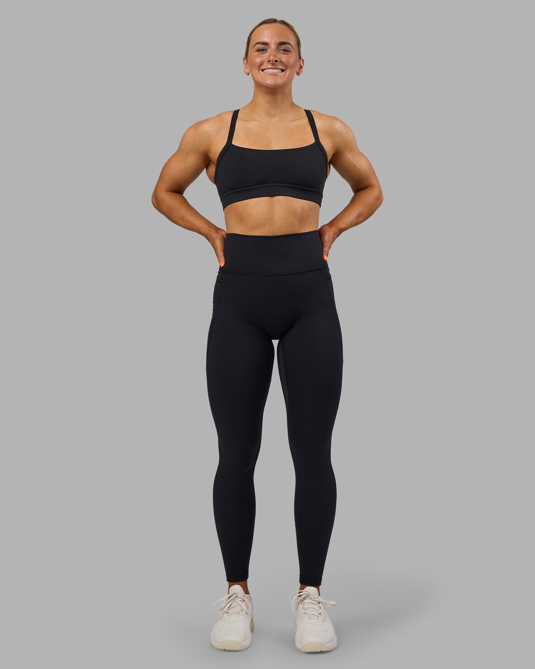 Woman wearing Fusion Ultra High-Rise Full Length Legging Pockets - Black | Model:Georgia | Size:S
