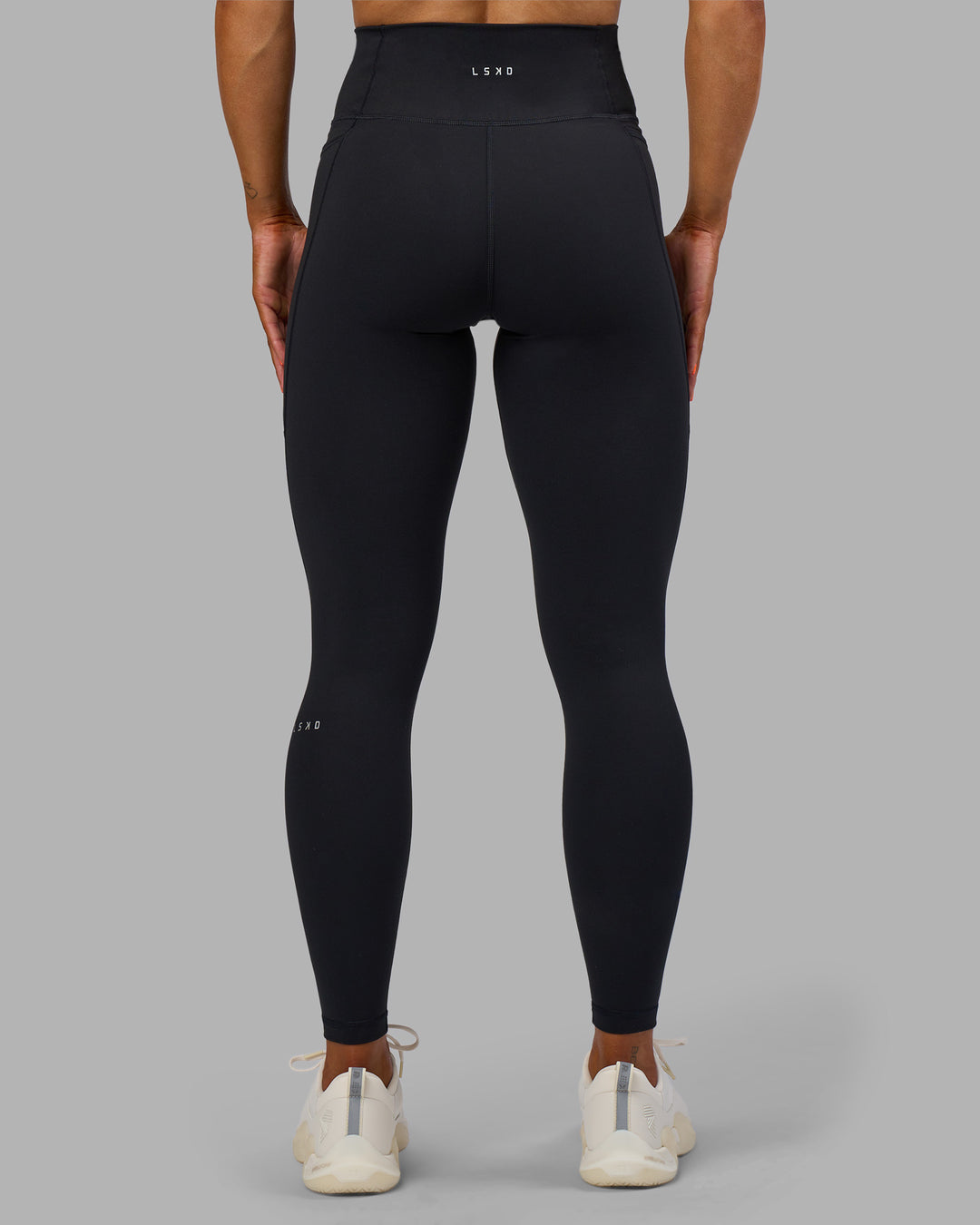 Woman wearing Fusion Ultra High-Rise Full Length Legging Pockets - Black | Model:Georgia | Size:S