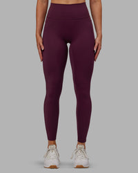 Woman wearing Fusion Ultra High-Rise Full Length Legging Pockets - Cherry Lacquer | Model:Paris | Size:S