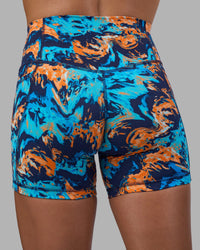 Woman wearing Fusion High-Rise 6" Short Pockets - React Print | Model:Katie | Size:S