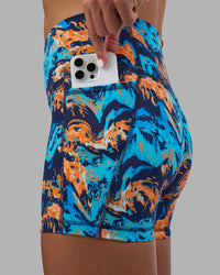Woman wearing Fusion High-Rise 6" Short Pockets - React Print | Model:Katie | Size:S