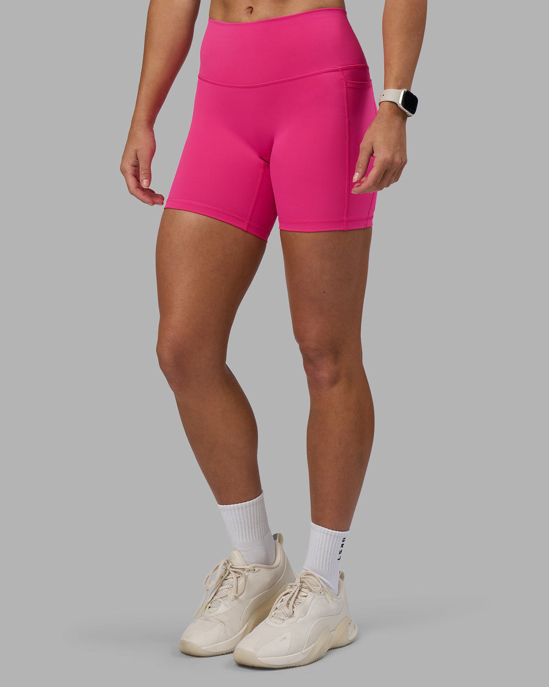 Woman wearing Fusion High-Rise 6&quot; Short Pockets - Ultra Pink | Model:Hannah | Size:S