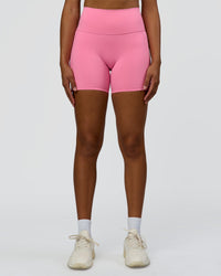 Woman wearing Fusion High-Rise 6" Short Pockets - Candy Pink | Model:Rosie | Size:S