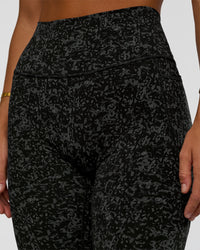 Woman wearing Fusion Icon Ultra High-Rise Full Length Legging Pockets - Energy Print Black-Reflective | Model:Amity | Size:S