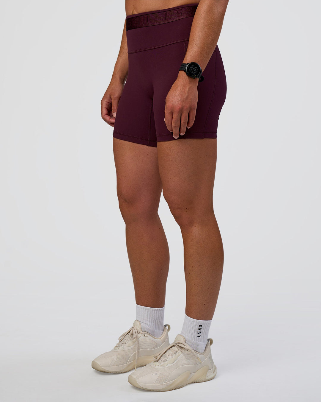 Woman wearing Fusion Jacquard High-Rise 6&quot; Short Pockets - Cherry Lacquer | Model:Sav | Size:S