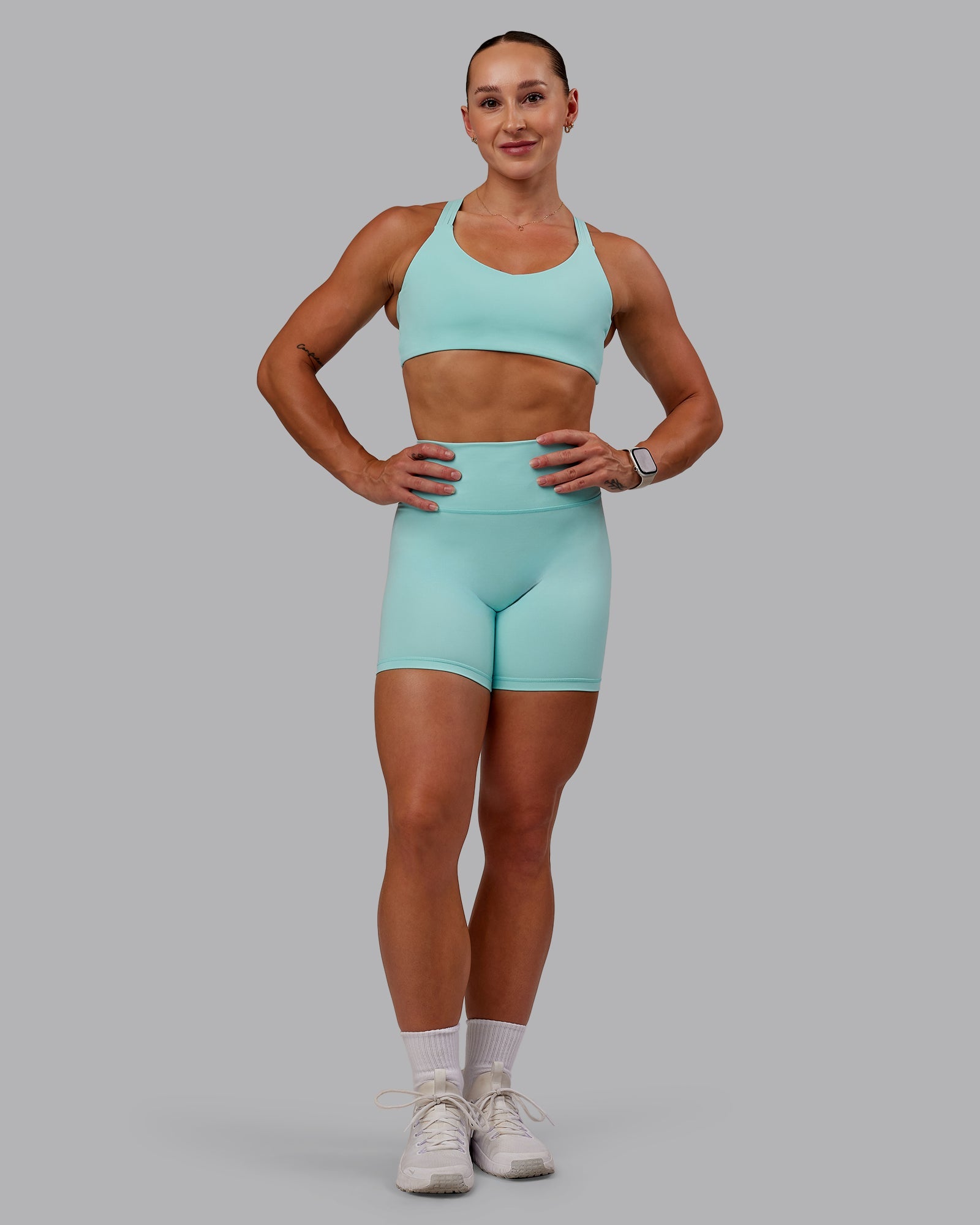 Woman wearing Fusion Ultra High-Rise 6" Short - Island Paradise | Model:Amber | Size:S
