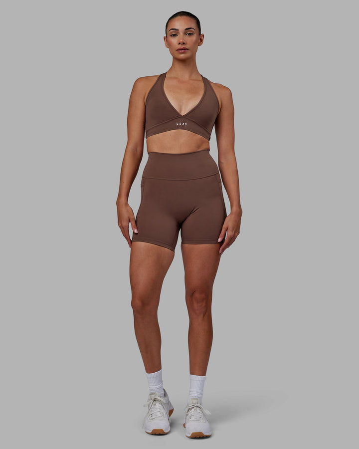 Woman wearing Fusion Mid-Length Shorts - Dull Rust
