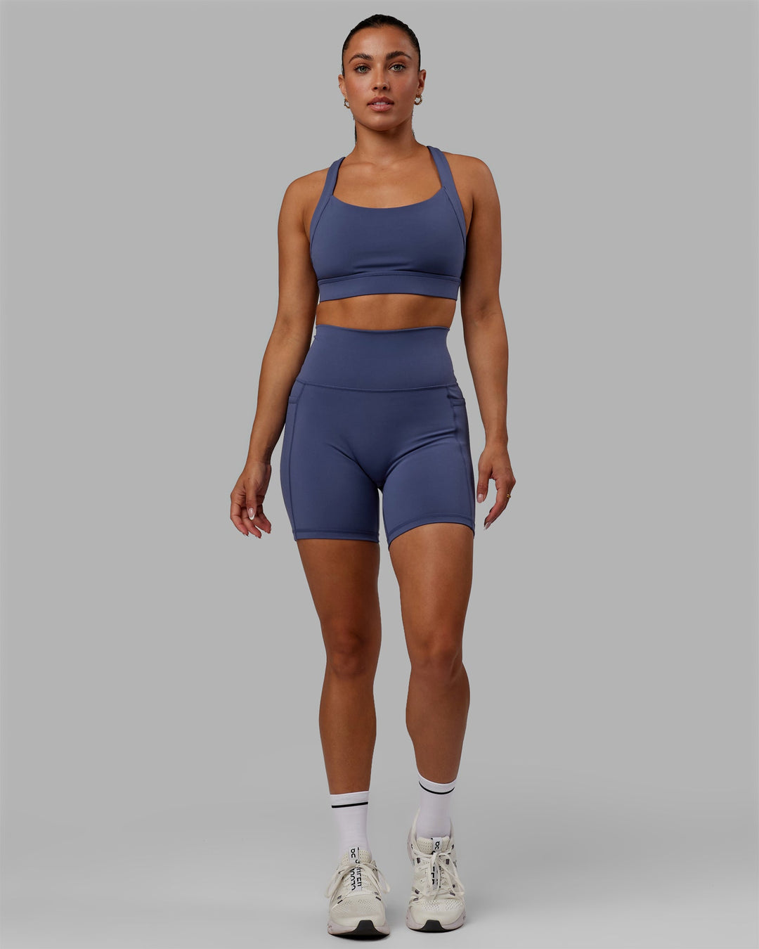 Woman wearing Fusion Ultra High-Rise 6" Short Pockets - Future Dusk | Model:Gabby | Size:S