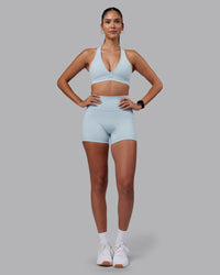 Woman wearing Fusion Ultra High-Rise 4" Short Pockets - Skyride | Model:Rhiley | Size:S