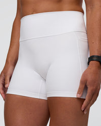 Woman wearing Fusion Ultra High-Rise 4" Short Pockets - White | Model:Sav | Size:S
