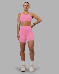 Woman wearing Fusion Ultra High-Rise 6" Short - Candy Pink | Model:Keisha | Size:S