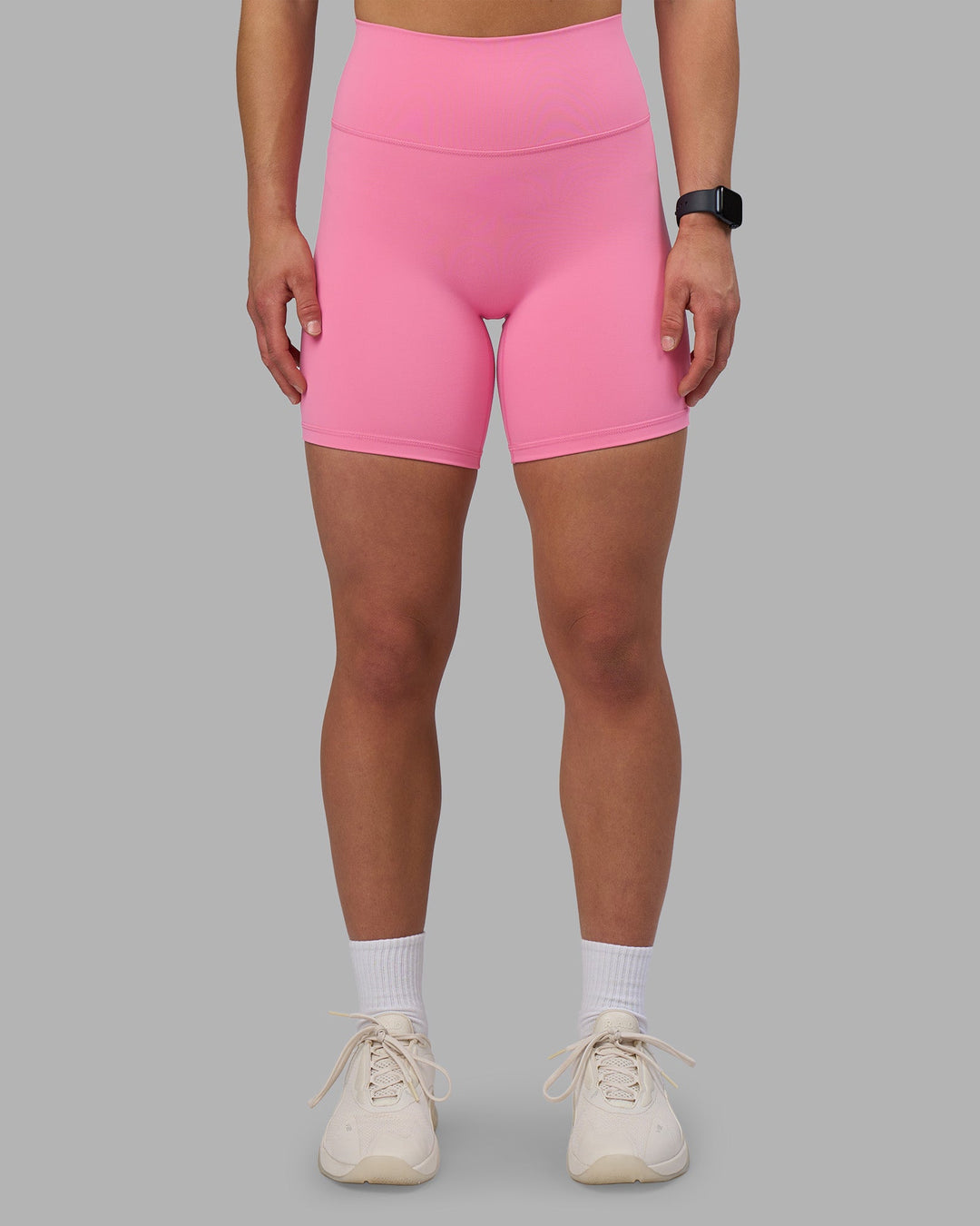 Woman wearing Fusion Ultra High-Rise 6&quot; Short - Candy Pink | Model:Keisha | Size:S