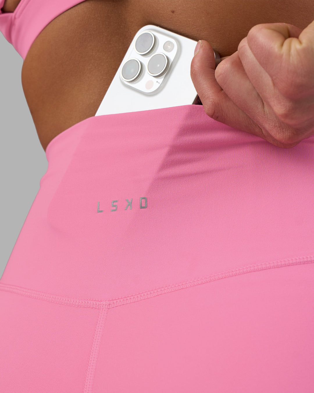 Woman wearing Fusion Ultra High-Rise 6&quot; Short - Candy Pink | Model:Keisha | Size:S