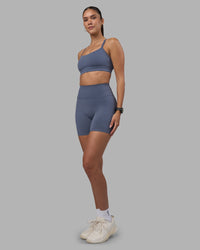 Woman wearing Fusion Ultra High-Rise 6" Short - Night Shadow | Model:Rhiley | Size:S