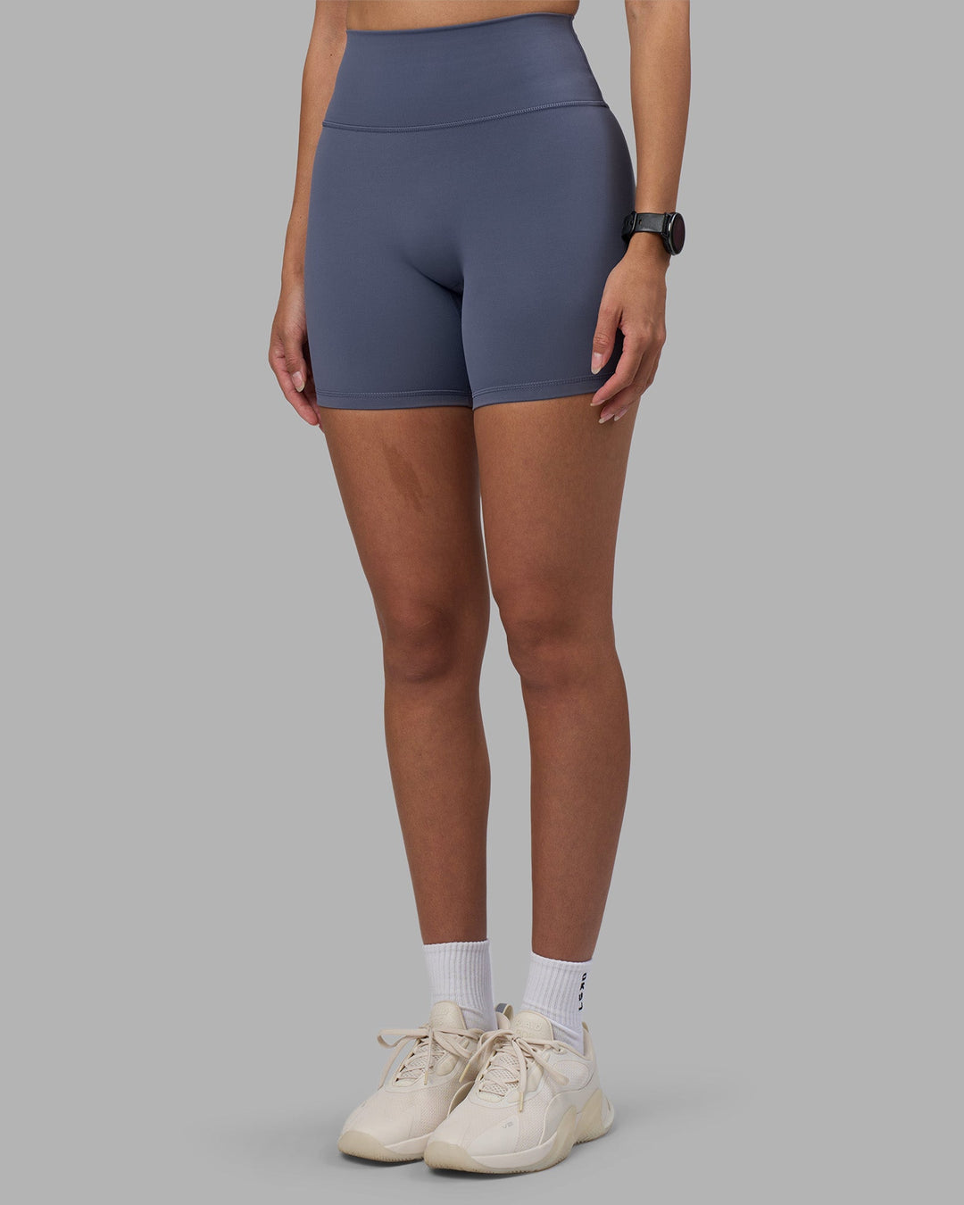 Woman wearing Fusion Ultra High-Rise 6&quot; Short - Night Shadow | Model:Rhiley | Size:S