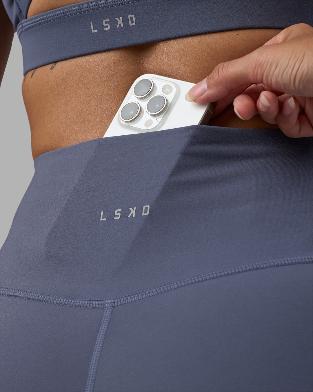 Woman wearing Fusion Ultra High-Rise 6&quot; Short - Night Shadow | Model:Rhiley | Size:S