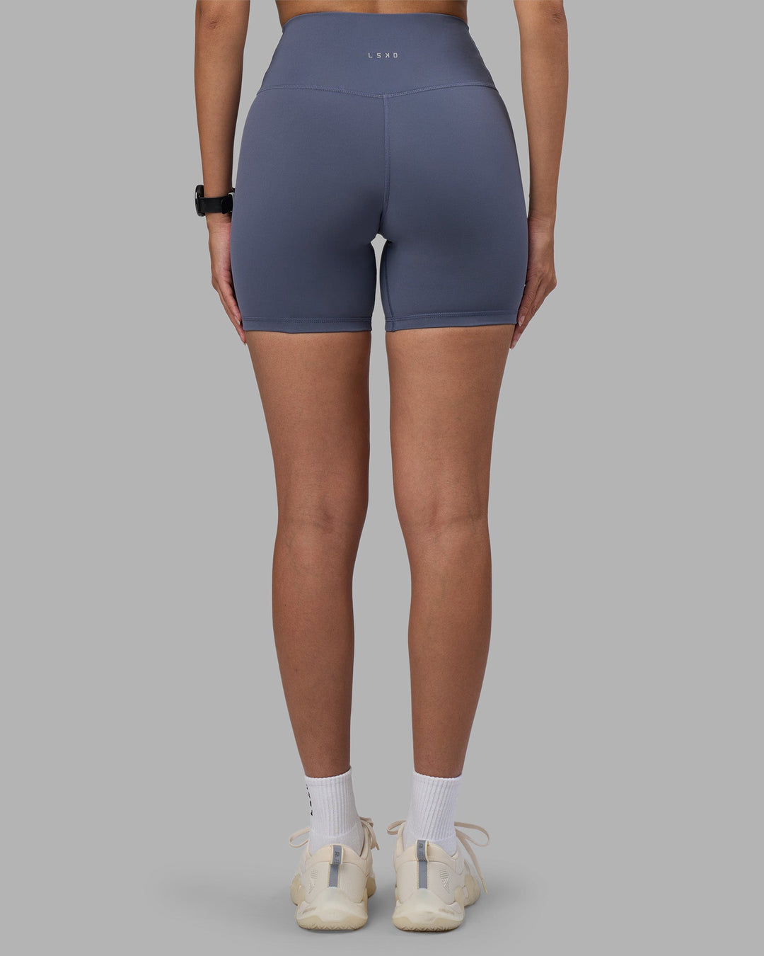 Woman wearing Fusion Ultra High-Rise 6&quot; Short - Night Shadow | Model:Rhiley | Size:S