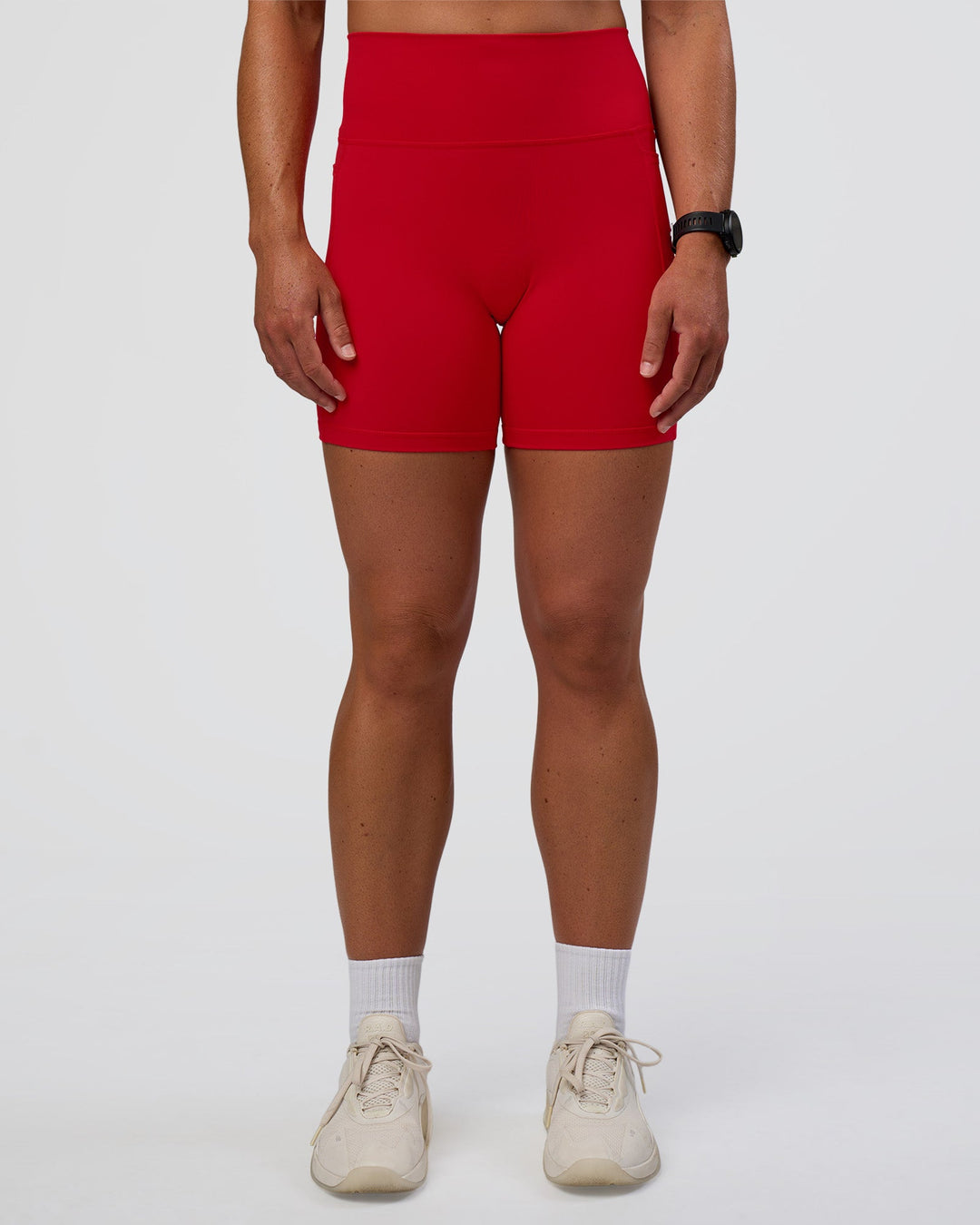 Woman wearing Fusion Ultra High-Rise 6" Short Pockets - Flame | Model:Sav | Size:S