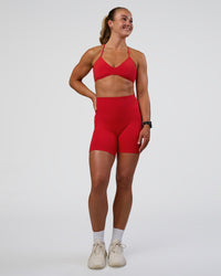 Woman wearing Fusion Ultra High-Rise 6" Short Pockets - Flame | Model:Sav | Size:S