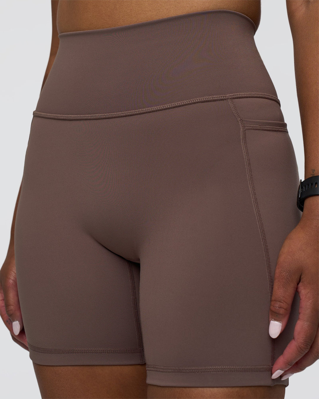 Woman wearing Fusion Ultra High-Rise 6&quot; Short Pockets - Peppercorn | Model:Rica | Size:S